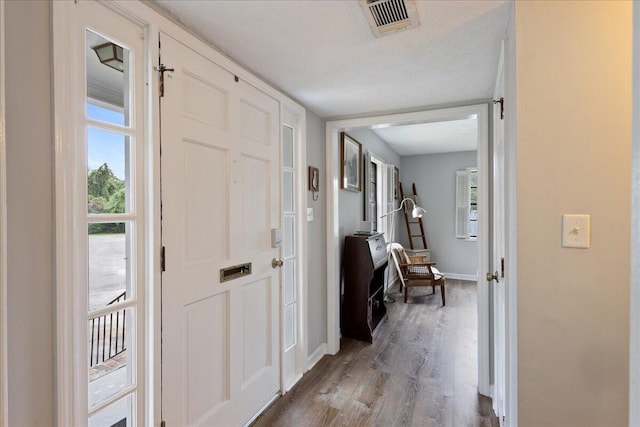 2920 Arrowhead Dr, Augusta, GA 30909 - foyer featuring plenty of natural light, wood finished floors, and baseboards