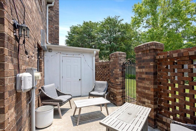 2920 Arrowhead Dr, Augusta, GA 30909 - view of patio with a gate and a storage unit