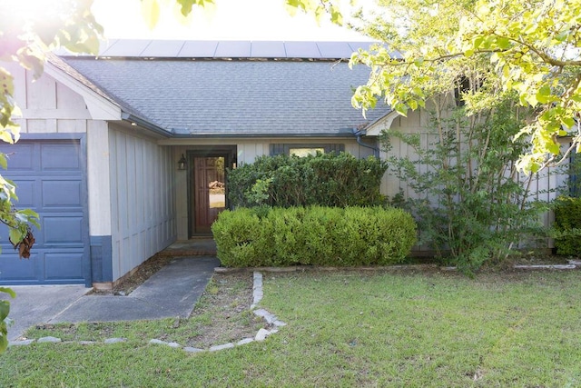 337 Patton Ct, Martinez, GA 30813 - view of front of house with roof with shingles, a front lawn, and a garage
