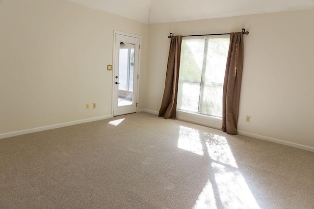 337 Patton Ct, Martinez, GA 30813 - unfurnished room featuring light colored carpet, baseboards, and lofted ceiling