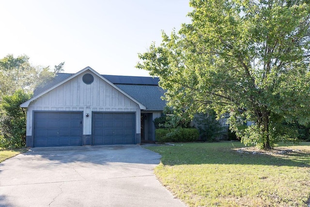 337 Patton Ct, Martinez, GA 30813 - single story home featuring a garage, driveway, a front lawn, and board and batten siding