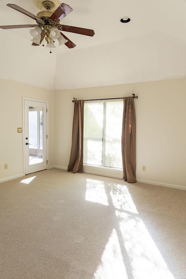 337 Patton Ct, Martinez, GA 30813 - empty room featuring light carpet, ceiling fan, vaulted ceiling, and baseboards
