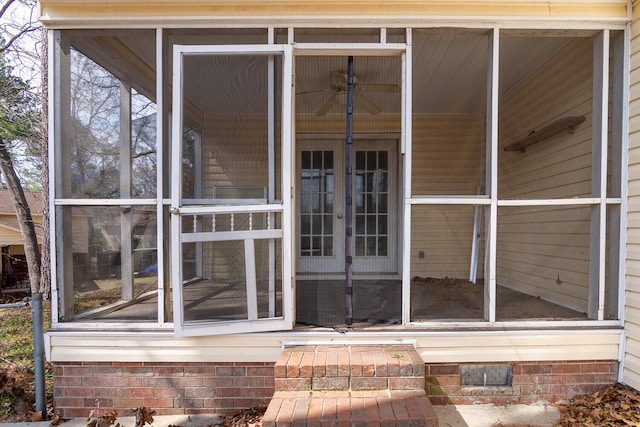 entrance to property featuring french doors