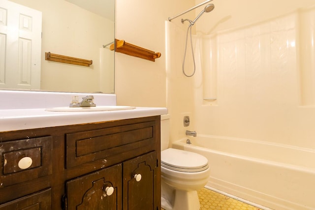 full bath featuring shower / bathing tub combination, toilet, and vanity