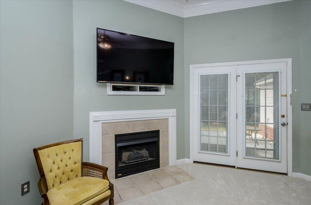 900 Mitchell Ln, Evans, GA 30809 - living area with carpet, baseboards, crown molding, and a tiled fireplace