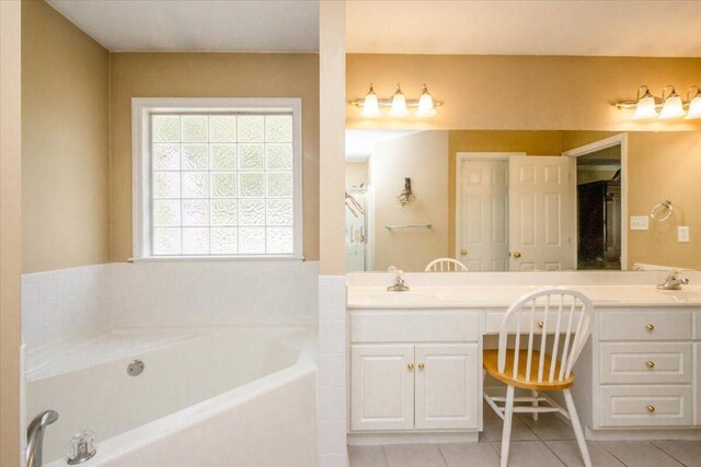 900 Mitchell Ln, Evans, GA 30809 - full bathroom featuring a bath, double vanity, and tile patterned flooring
