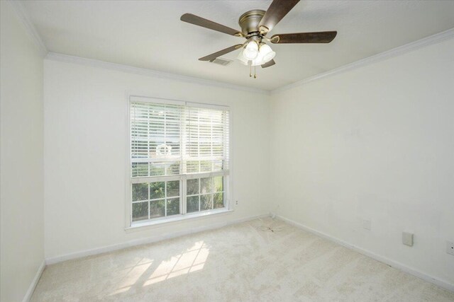 900 Mitchell Ln, Evans, GA 30809 - carpeted spare room featuring crown molding, plenty of natural light, a ceiling fan, and baseboards