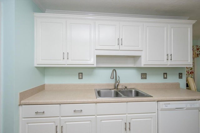 900 Mitchell Ln, Evans, GA 30809 - kitchen with white dishwasher, a sink, white cabinetry, and light countertops