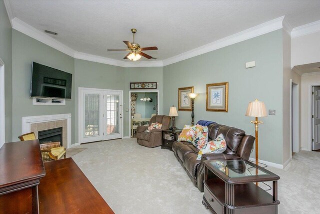 900 Mitchell Ln, Evans, GA 30809 - carpeted living area featuring ceiling fan, crown molding, baseboards, and a fireplace