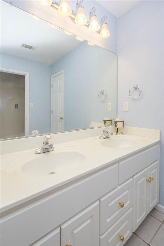 900 Mitchell Ln, Evans, GA 30809 - bathroom featuring double vanity and tile patterned floors