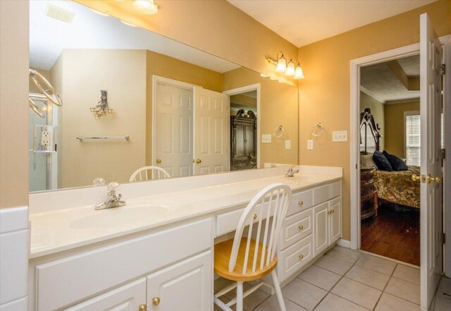 900 Mitchell Ln, Evans, GA 30809 - bathroom featuring connected bathroom, double vanity, and tile patterned floors