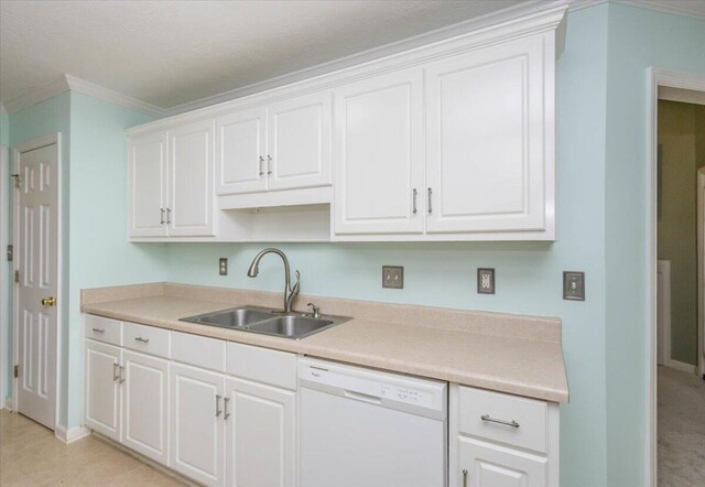 900 Mitchell Ln, Evans, GA 30809 - kitchen featuring white dishwasher, a sink, crown molding, white cabinetry, and baseboards