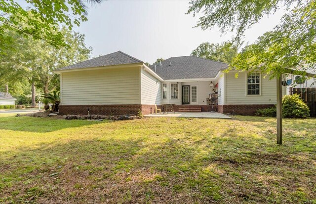 900 Mitchell Ln, Evans, GA 30809 - back of property with a patio and a yard
