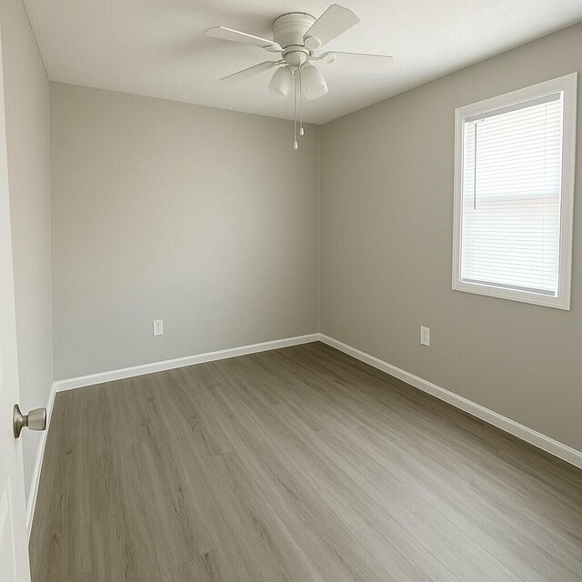 4612 Dunbarton Dr, Hephzibah, GA 30815 - spare room with ceiling fan, baseboards, and wood finished floors