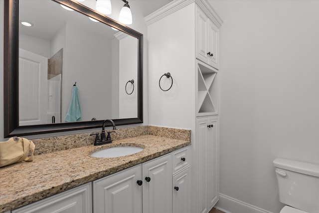 5099 Grande Park, Evans, GA 30809 - full bathroom with toilet, vanity, and baseboards