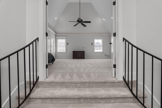 5099 Grande Park, Evans, GA 30809 - stairway with carpet floors, high vaulted ceiling, plenty of natural light, a ceiling fan, and baseboards