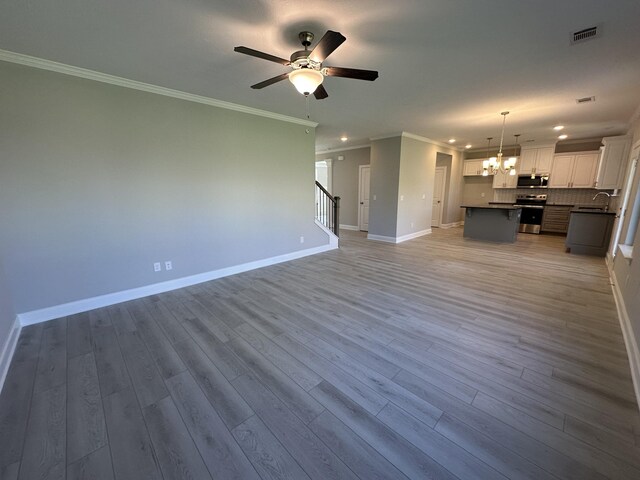 5051 Anna Way Unit Fb23, North Augusta, SC 29841 - carpeted empty room with crown molding, a tray ceiling, and ceiling fan