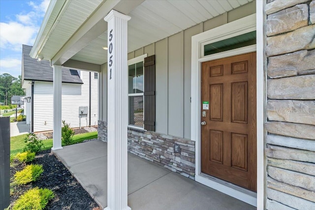 5051 Anna Way Unit Fb23, North Augusta, SC 29841 - view of exterior entry featuring a porch, board and batten siding, and stone siding