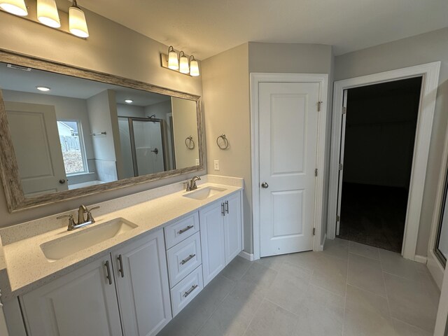 5051 Anna Way Unit Fb23, North Augusta, SC 29841 - bathroom featuring vanity, a shower with shower door, and tile patterned flooring