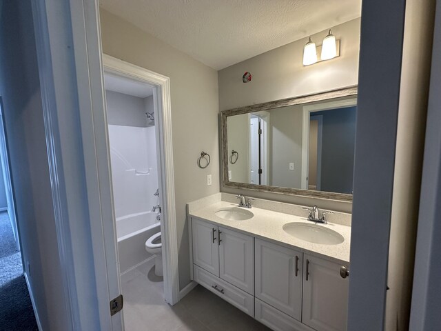 5051 Anna Way Unit Fb23, North Augusta, SC 29841 - full bathroom with washtub / shower combination, tile patterned flooring, vanity, a textured ceiling, and toilet