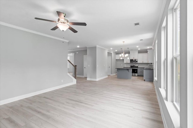 5051 Anna Way Unit Fb23, North Augusta, SC 29841 - unfurnished living room with ornamental molding, ceiling fan, recessed lighting, light wood-type flooring, and stairs