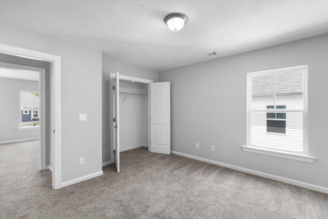 5051 Anna Way Unit Fb23, North Augusta, SC 29841 - unfurnished bedroom featuring carpet floors and a closet