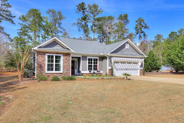 338 Pro Cir, Mccormick, SC 29835 - view of front of home with a front lawn, stone siding, a garage, and driveway