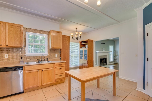 kitchen with decorative backsplash, light brown cabinetry, stainless steel dishwasher, ornamental molding, and sink