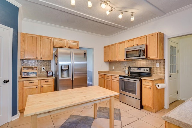 kitchen with backsplash, stainless steel appliances, and light brown cabinetry