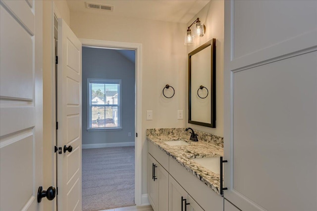 bathroom featuring vanity