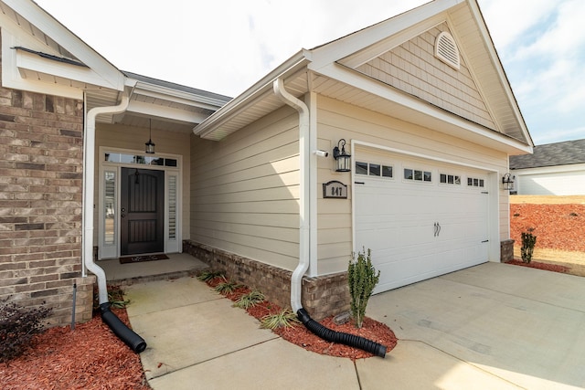 entrance to property featuring a garage