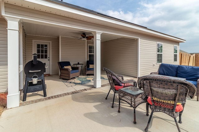 view of patio featuring an outdoor living space, a grill, and ceiling fan