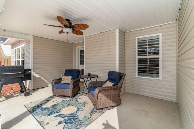 view of patio / terrace featuring a grill and ceiling fan