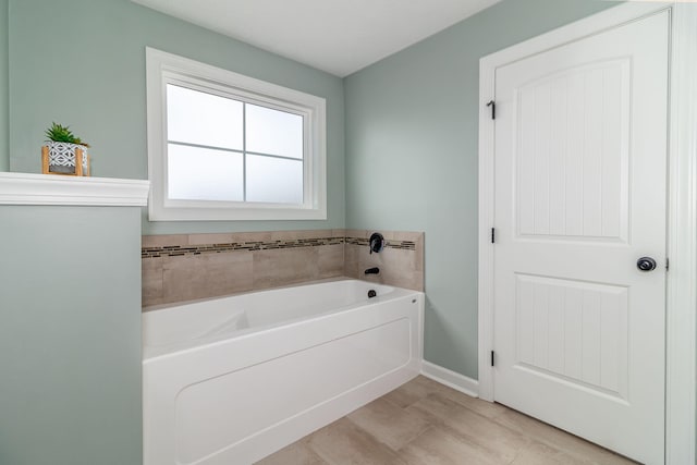 bathroom featuring a washtub