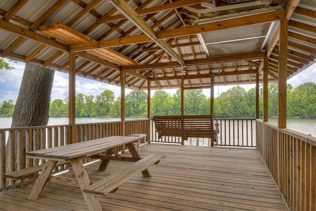 wooden terrace with a water view