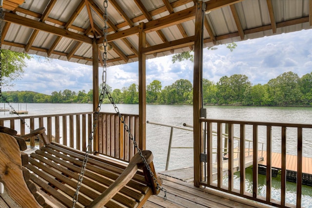 dock area with a gazebo and a water view