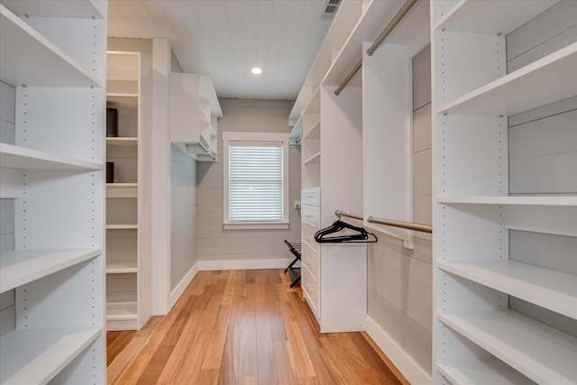 walk in closet featuring light wood-style floors