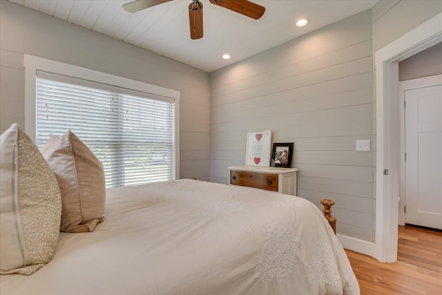 bedroom with recessed lighting, a ceiling fan, and light wood finished floors