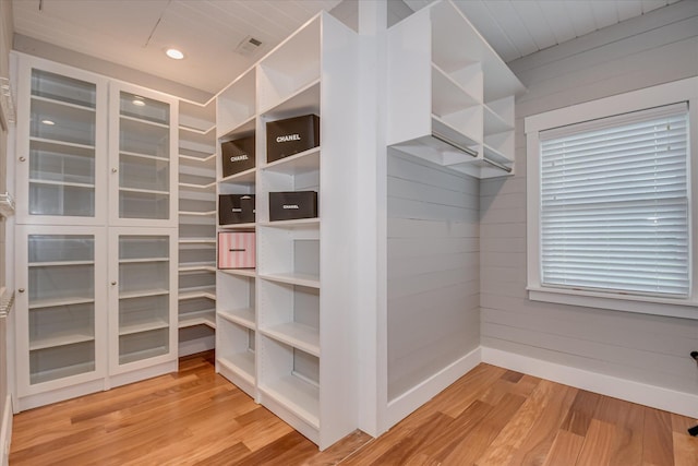 walk in closet featuring light wood-style floors and visible vents