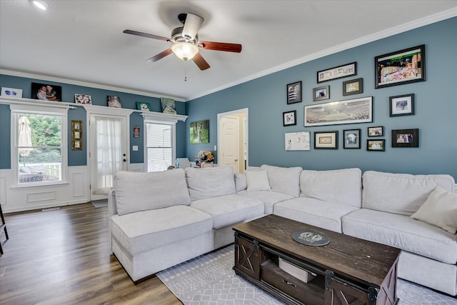 32 Creekside Dr, Aiken, SC 29803 - living area featuring wood finished floors, ceiling fan, ornamental molding, and a wainscoted wall