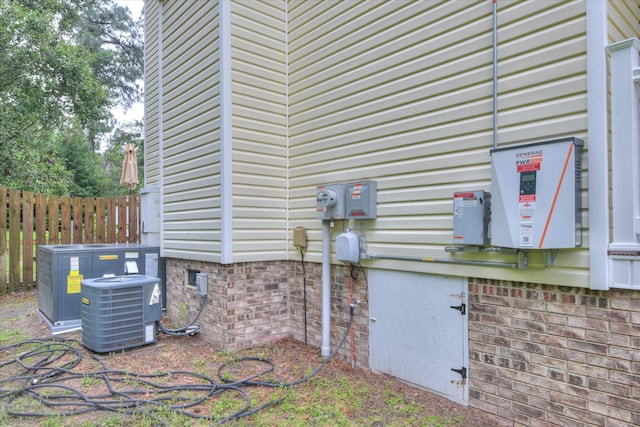 32 Creekside Dr, Aiken, SC 29803 - exterior view of cooling unit, electric meter, and crawl space