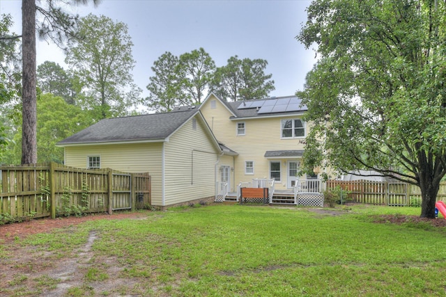 32 Creekside Dr, Aiken, SC 29803 - back of house with solar panels and a deck