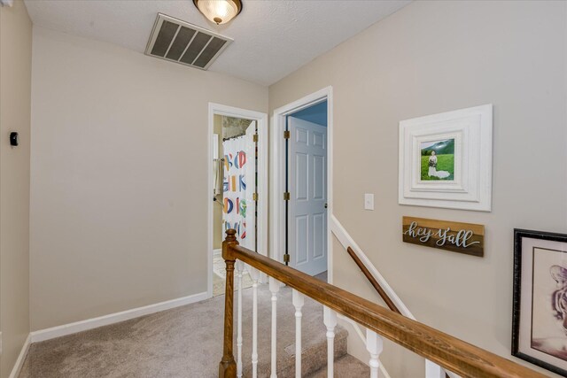 32 Creekside Dr, Aiken, SC 29803 - hall with carpet flooring, baseboards, and an upstairs landing
