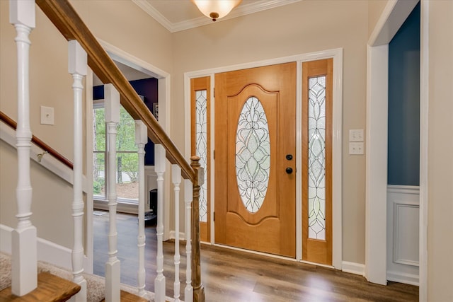 32 Creekside Dr, Aiken, SC 29803 - entrance foyer featuring stairs, wood finished floors, ornamental molding, and wainscoting