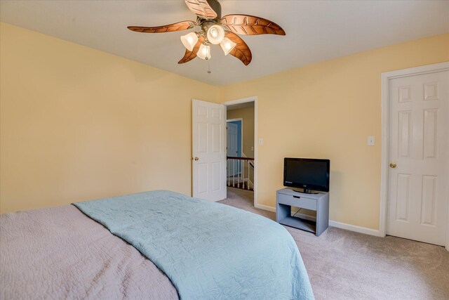 32 Creekside Dr, Aiken, SC 29803 - bedroom featuring light colored carpet, ceiling fan, and baseboards