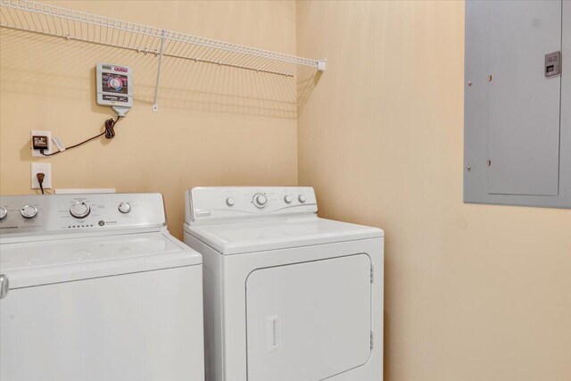 laundry area featuring washer and dryer, laundry area, and electric panel
