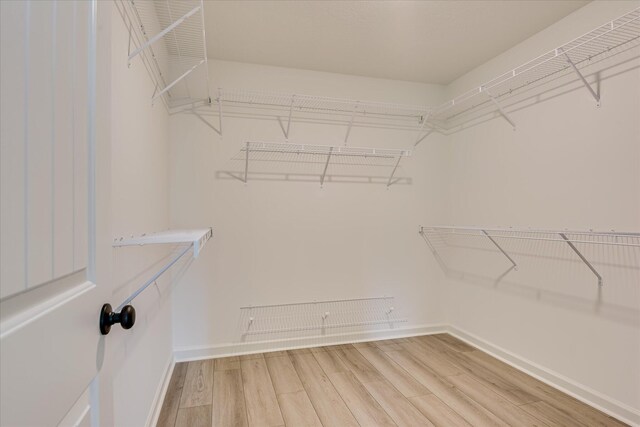 4932 Fairmont Dr, Graniteville, SC 29829 - spacious closet featuring wood finished floors