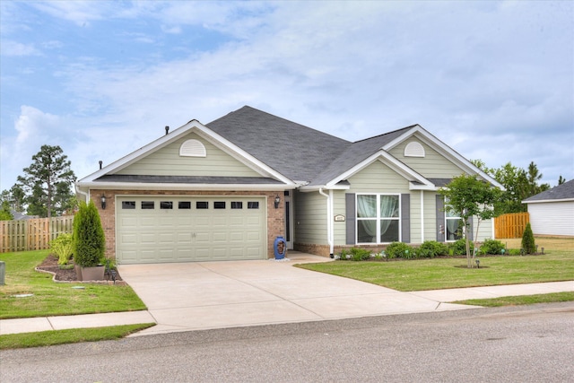 4932 Fairmont Dr, Graniteville, SC 29829 - ranch-style home featuring driveway, a front yard, a garage, brick siding, and fence