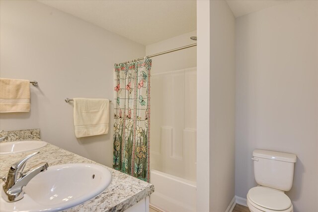 4932 Fairmont Dr, Graniteville, SC 29829 - bathroom with a sink, toilet, double vanity, and shower / tub combo with curtain