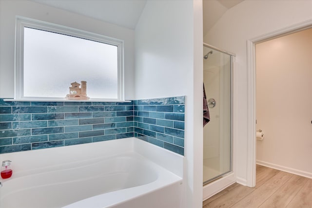 4932 Fairmont Dr, Graniteville, SC 29829 - full bath featuring baseboards, wood finished floors, a garden tub, and a stall shower